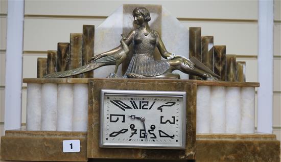 A French Art Deco bronze and two colour marble clock garniture, clock width 20in.